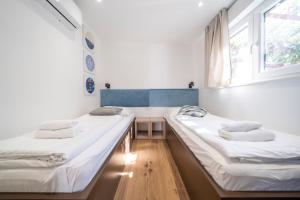 Posteľ alebo postele v izbe v ubytovaní Villas Terraneo