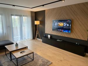 Et tv og/eller underholdning på AS Apartments