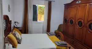 Postel nebo postele na pokoji v ubytování Casa" VISTAS AL TEIDE" mar Piscina privada parking cubierto gratuito en las instalaciones