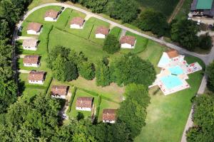an aerial view of a house with a yard at Lac De Cancon in Cancon