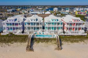 an aerial view of a large house on the beach at My Turn at Surf City in Surf City