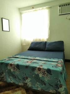 Krevet ili kreveti u jedinici u okviru objekta ARREZO PLACE DAVAO CONDOMINIUIM DAVAO CITY