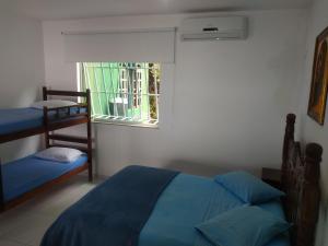 Hostel Vista do Mar客房内的一张或多张床位