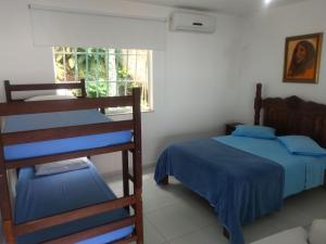 Hostel Vista do Mar客房内的一张或多张床位