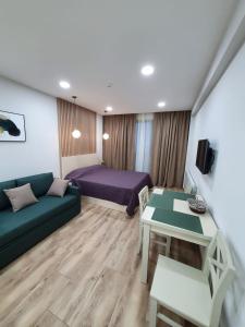 TV a/nebo společenská místnost v ubytování New Gudauri Twins, 436, Lovely Studio