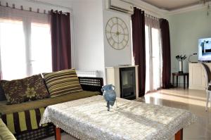 Posezení v ubytování Confortables location familiale vue sur mer à Sidj Fredj-Staoueli Alger