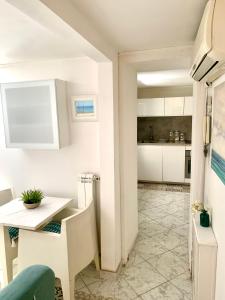 Kuchyň nebo kuchyňský kout v ubytování Casa del corso