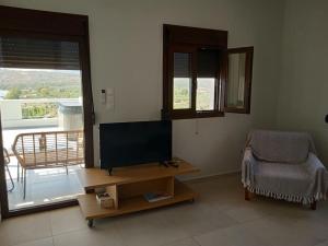 TV/trung tâm giải trí tại Kamares View (Απέραντο Γαλάζιο)