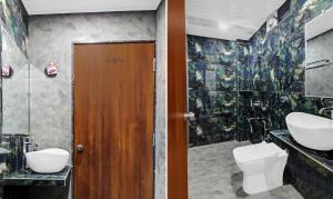 Bagno di Treebo Hotel Rk Inn, Railway Station