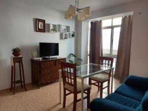 TV a/nebo společenská místnost v ubytování Corazón de Aguilar