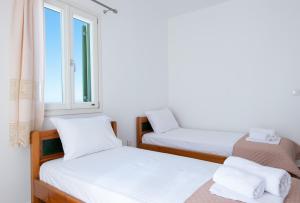 Postel nebo postele na pokoji v ubytování Villa Marmara