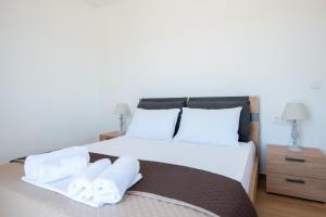 Postel nebo postele na pokoji v ubytování Villa Marmara