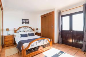 Posteľ alebo postele v izbe v ubytovaní Casa Bellavista