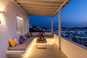 A seating area at Yalos mykonos 3 bedroom Luxury home in Mykonos Town with Sea & Sunset view