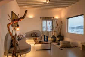 A seating area at Yalos mykonos 3 bedroom Luxury home in Mykonos Town with Sea & Sunset view