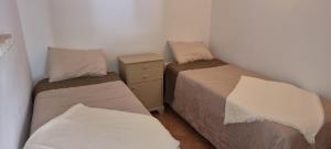 Łóżko lub łóżka w pokoju w obiekcie Casa a Santa Maria di Leuca