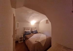 Łóżko lub łóżka w pokoju w obiekcie Casa a Santa Maria di Leuca