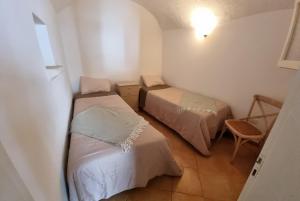 Łóżko lub łóżka w pokoju w obiekcie Casa a Santa Maria di Leuca