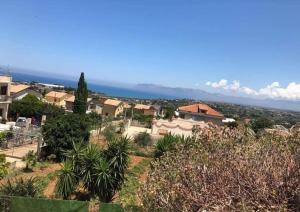 a view of a neighborhood with houses and trees at appartamento in villa splendente in Castellammare del Golfo +14 photos