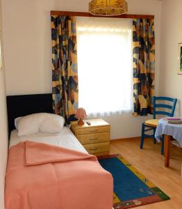 Een bed of bedden in een kamer bij Strandhotel Pichler