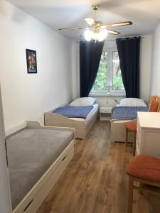 Katil atau katil-katil dalam bilik di Ferienwohnung mit Brockenblick