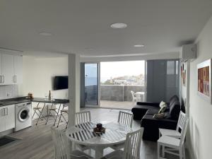 Posezení v ubytování Apartamento Ipa Gonca en Morrojable + 34 fotografií