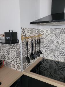 Kuchyňa alebo kuchynka v ubytovaní Appartement rénové près république
