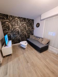 Posedenie v ubytovaní Appartement rénové près république