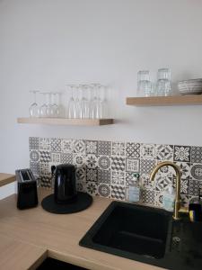 Kuchyňa alebo kuchynka v ubytovaní Appartement rénové près république