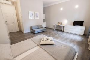 a living room with a couch and a table at 4flats in Maribor