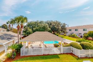 a backyard with a gazebo and a pool at Woodland Shores #20 in Destin