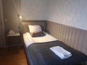 Letto o letti in una camera di Toftastrand Hotell