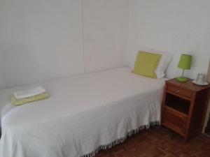 Postel nebo postele na pokoji v ubytování Caravela