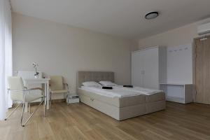 Postel nebo postele na pokoji v ubytování Pawilon Sportowo Turystyczny Kalwarianka