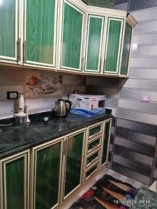 A cozinha ou kitchenette de شقه مفروشه فرش فندقي