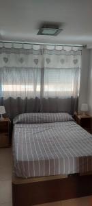 Postel nebo postele na pokoji v ubytování Apartamento ÉLITE en Cullera playa San Antonio