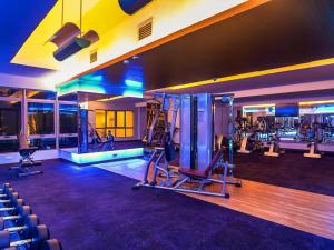 a gym with cardio equipment in a hotel at Shaftsbury residence cyberjaya with a pool & Free Parking in Cyberjaya