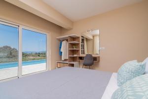 Posteľ alebo postele v izbe v ubytovaní Spartakos Luxury Villa 3