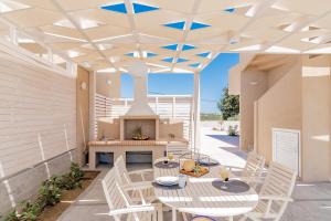 Balkón alebo terasa v ubytovaní Spartakos Luxury Villa 3