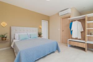 Posteľ alebo postele v izbe v ubytovaní Spartakos Luxury Villa 3