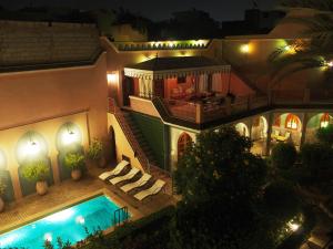 an aerial view of a house with a swimming pool at Riad Dar Hajra in Taroudant