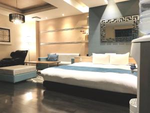 Postel nebo postele na pokoji v ubytování Hotel Square FujiGotemba