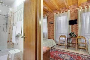 Koupelna v ubytování Locanda Delle Acque