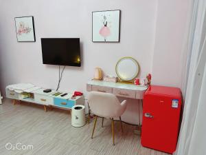 TV a/nebo společenská místnost v ubytování ㄧ個背包客棧