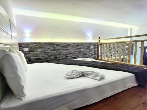 Posteľ alebo postele v izbe v ubytovaní Vlycha Beach Apartments