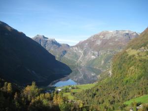 a view of a lake in a mountain valley at Lunheim in Geiranger in Geiranger