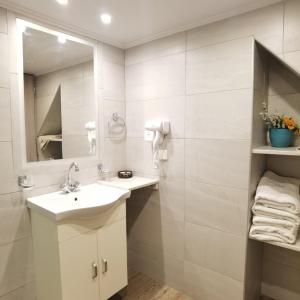 Kúpeľňa v ubytovaní Vlycha Beach Apartments