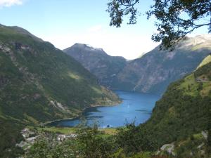 a view of a mountain lake in a valley at Lunheim in Geiranger in Geiranger
