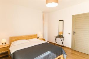 Letto o letti in una camera di The Lazy Bear