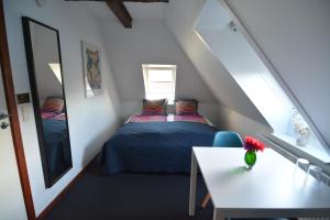 Postel nebo postele na pokoji v ubytování Billesgade Rooms